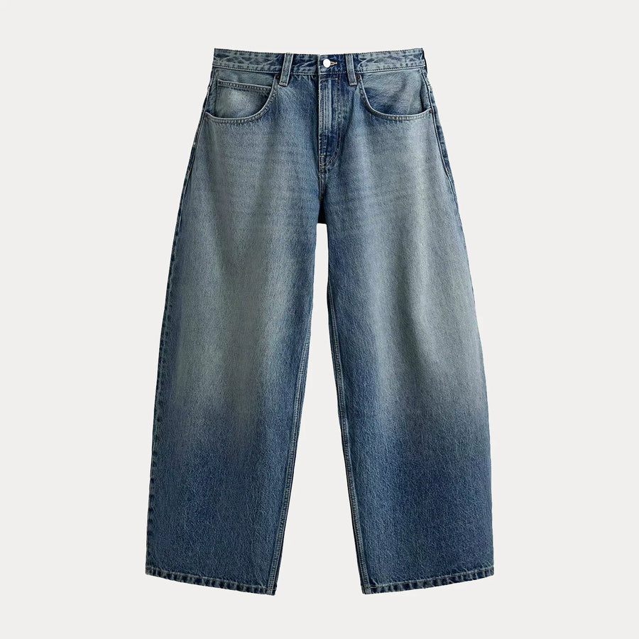 Washed Curved-Leg Denim Jeans