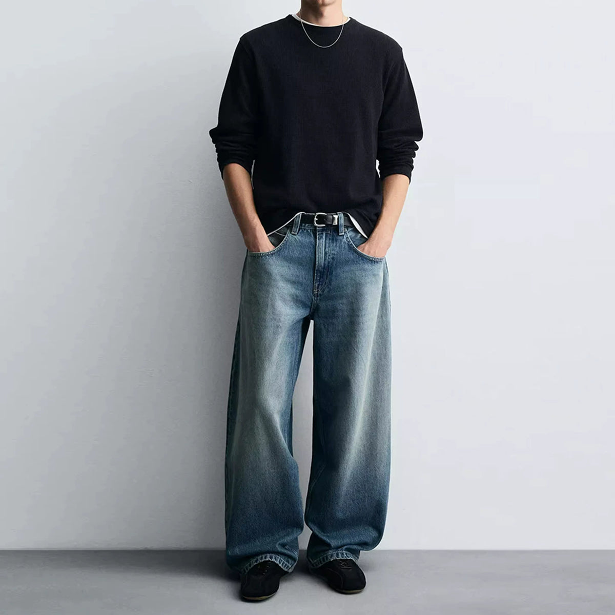 Washed Curved-Leg Denim Jeans